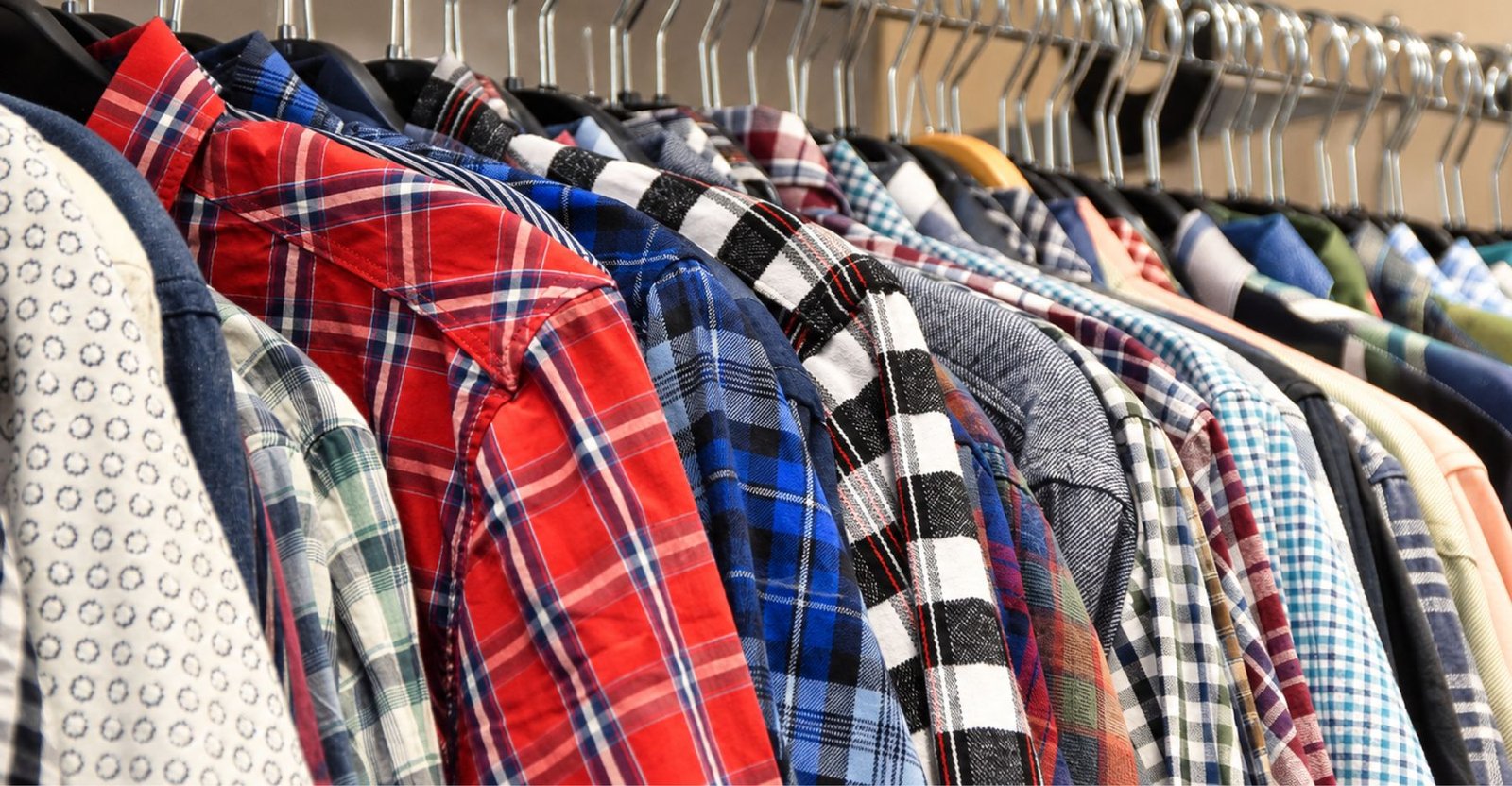 A long rail of checked and patterned woven shirts